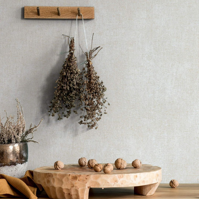 Vliestapete mit leichter, sandiger Struktur beige Uni