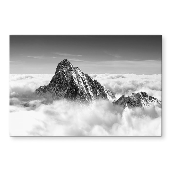 Acrylglasbild Bergspitze über den weissen Wolken
