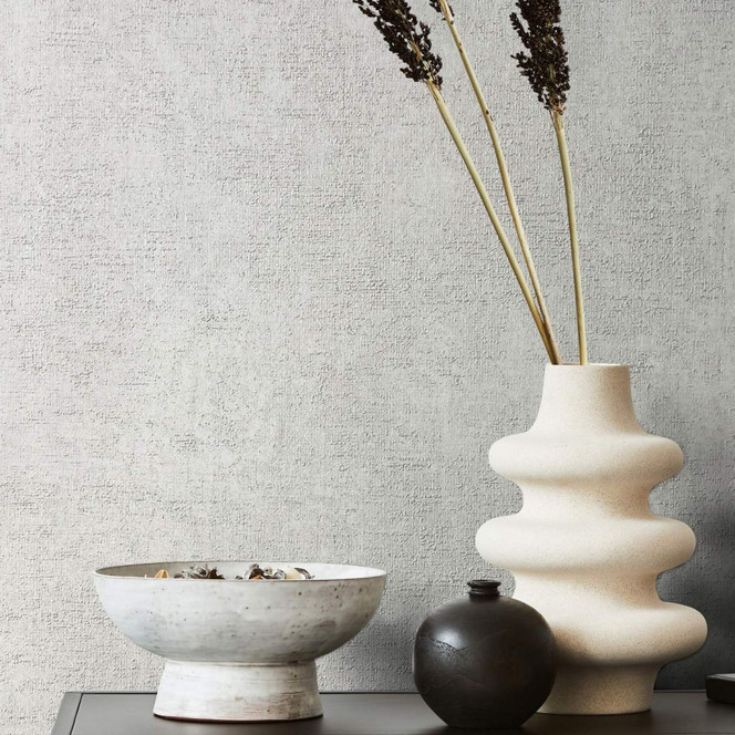 Vliestapete mit leichter, sandiger Struktur grau Uni