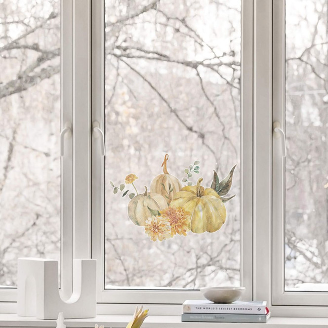 Fensterbild Kürbistrio im Herbstgarten